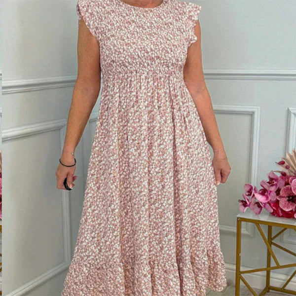 Elegante vestido con estampado floral, cintura alta y mangas con volantes